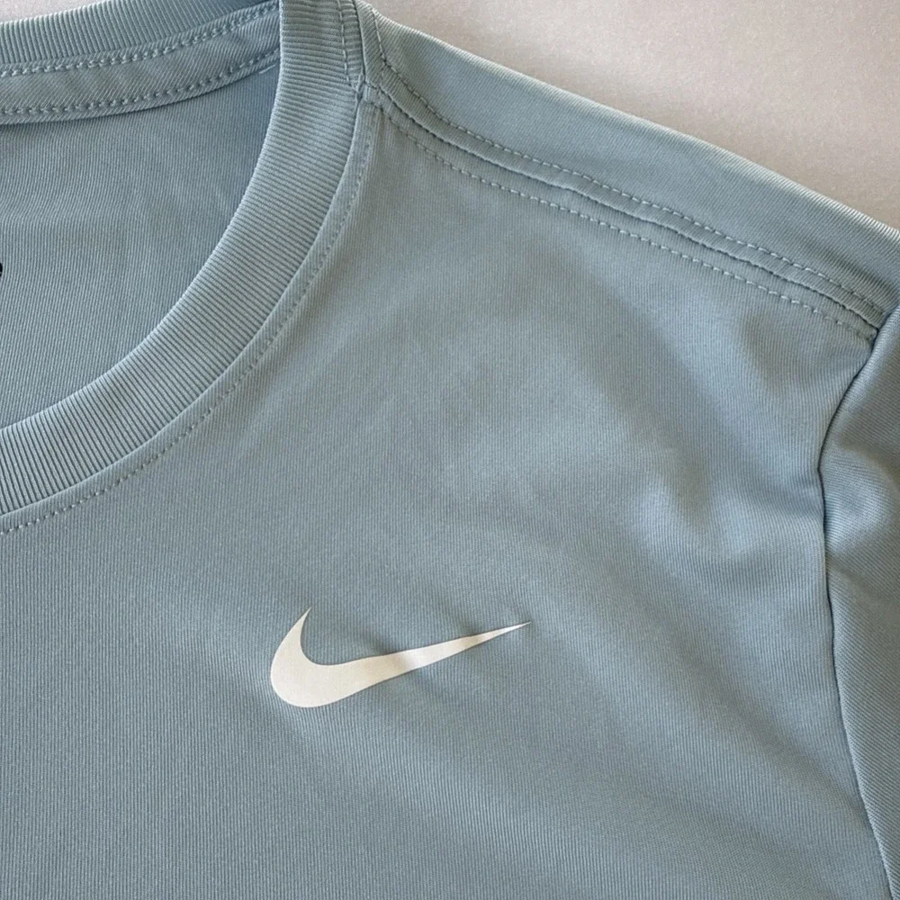 The Nike Tee Shirt XL Women's Powder BlueDri-Fit White Swoosh Gym Sports Workout
